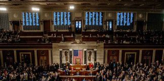 U.S. House chamber with lawmakers gathered before a session