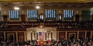 U.S. House chamber with lawmakers gathered on the floor