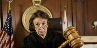Judge with gavel in courtroom