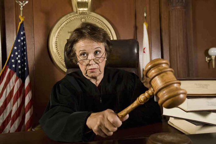 shutterstock_122182672 Judge with gavel in courtroom