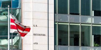 U.S. Securities and Exchange Commission building with flag