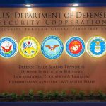 China HOLDS Pentagon Delegation HOSTAGE! U.S. Department of Defense display wall with service seals