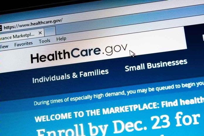 shutterstock_166171757 Screenshot of the HealthCare.gov website with enrollment information