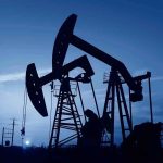 Oil Jobs on the CUTTING BLOCK — Look WHO CREATED The Bill Oil pumpjacks silhouetted against a twilight sky