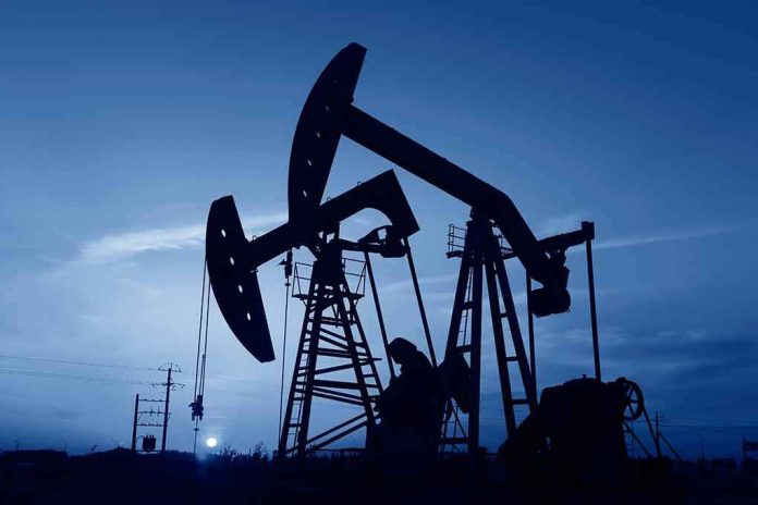 shutterstock_1672890445 Oil pumpjacks silhouetted against a twilight sky