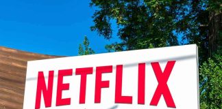 Netflix in the HOT SEAT — AGAIN! Netflix sign at outdoor campus