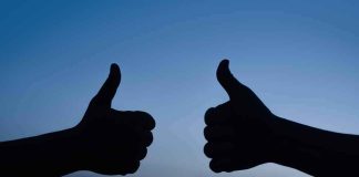 Rare Alliance — Schiff BACKS Trump! two hands giving thumbs up against a blue sky