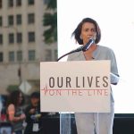 Just 16 Votes — And The Answer Was SHOCKING woman speaking at a podium during an outdoor event