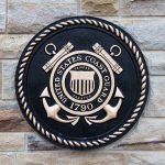THE CATCH — The Judge Was Their Own APPOINTEE Bronze emblem of the United States Coast Guard mounted on a stone wall