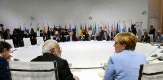G20’s AI Shock — EVERYONE AGREED to THIS! delegates seated around a large round conference table