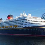 Hantavirus Quarantine Sparks Fears of Overreach Cruise ship docked at a modern harbor terminal