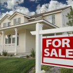 STATE Takeover Threat RATTLES HOME OWNERS A suburban house with a For Sale sign in the front yard
