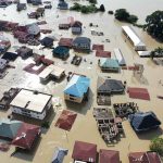 Terrifying MASSIVE BUILDING Collapse Caught On Video Aerial view of flooded residential neighborhood