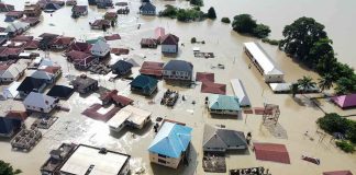 Terrifying MASSIVE BUILDING Collapse Caught On Video Aerial view of flooded residential neighborhood