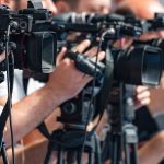 CBS KILLS Colbert’s Late Show television cameras on tripods at a media event
