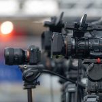 Colbert-Pascal Kiss Sparks Outrage Professional video cameras on tripods