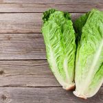 IF You Live In ONE of THESE 27 States, THROW OUT YOUR LETTUCE Romaine lettuce hearts on rustic wooden table