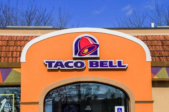 shutterstock_564358948 Taco Bell restaurant exterior with logo and sign