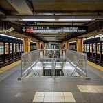 KNICKS EVE Chaos — Six Down, Suspect Nabbed — Now What? Subway platform with stairwell and tracks on both sides
