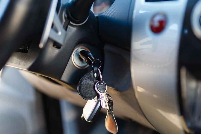 shutterstock_612938357-1 Car keys in ignition of a vehicle dashboard