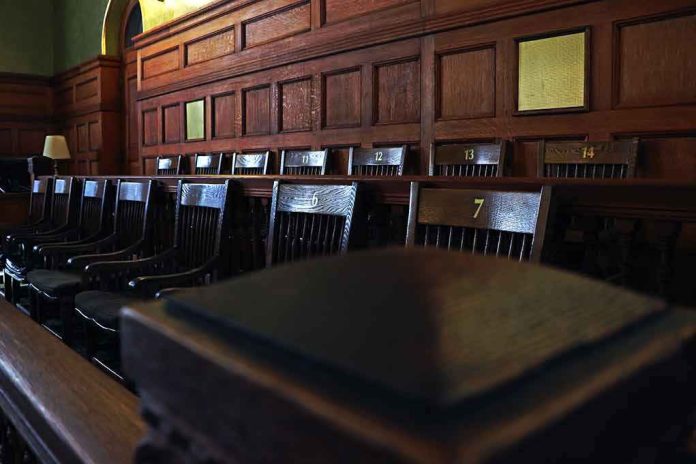 Empty wooden jury box with numbered chairs