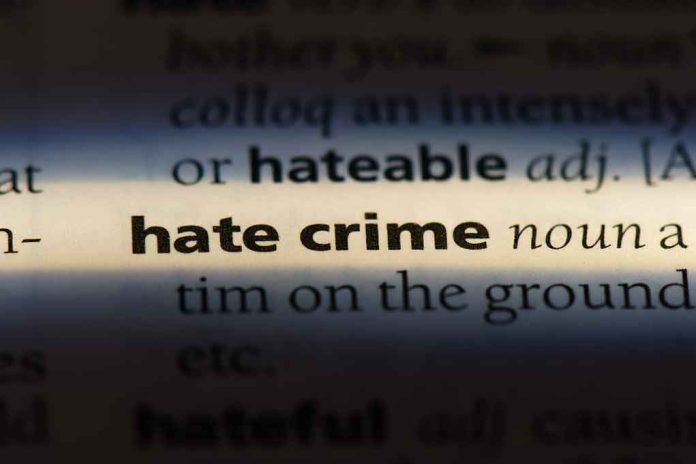 shutterstock_1148782202 Close-up of dictionary page highlighting the term hate crime