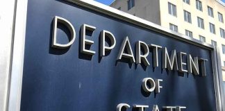 Department of State sign outside government building