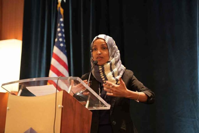 Ilhan Omar speaking at a podium with a microphone