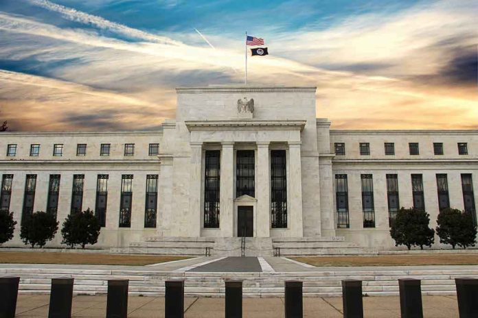 shutterstock_1655890180 Neoclassical government building with American flag at sunset