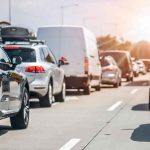 Traffic jam with cars and vans on a multi-lane highway