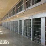 Prison Chief OUT After Failed Execution — What He Said UNDER OATH Prison cell block corridor with barred doors