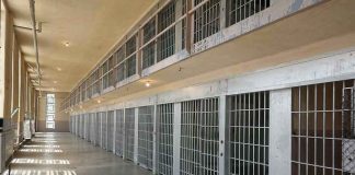 Prison Chief OUT After Failed Execution — What He Said UNDER OATH Prison cell block corridor with barred doors