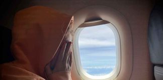 Jet’s EMBARRASSING Detour — And What The Pilot RADIOED Airplane passenger hiding face in hands beside the window