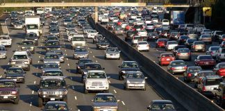 RECALL: SUV Can Go DEAD Mid-Merge — Traffic Right Behind You A busy highway filled with cars in a traffic jam