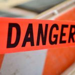 Danger tape at a construction barrier