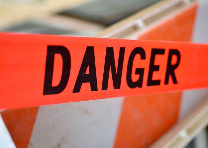 Danger tape at a construction barrier