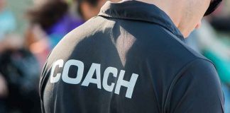 LEGENDARY Coach Dies — Look WHERE He Found His Star Coach wearing a black shirt with bold lettering