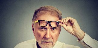 Army Blew $6.9 BILLION — What It Has To SHOW For It Older man lifting eyeglasses while looking intently at camera