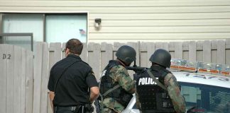 He Targeted The Texas Capitol — His Reason Is NOT What You Think police officers in tactical gear beside patrol car